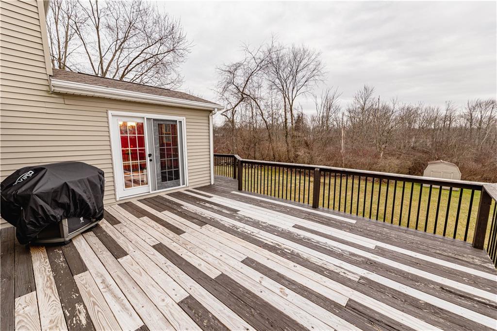 3673 Mitchell Road New Castle, PA 16105 - Photo 21 of 25 a view of a two chairs and table on the balcony