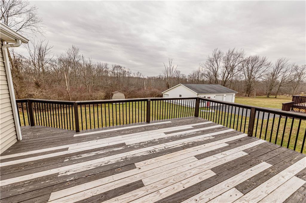3673 Mitchell Road New Castle, PA 16105 - Photo 22 of 25 a view of a wooden roof deck