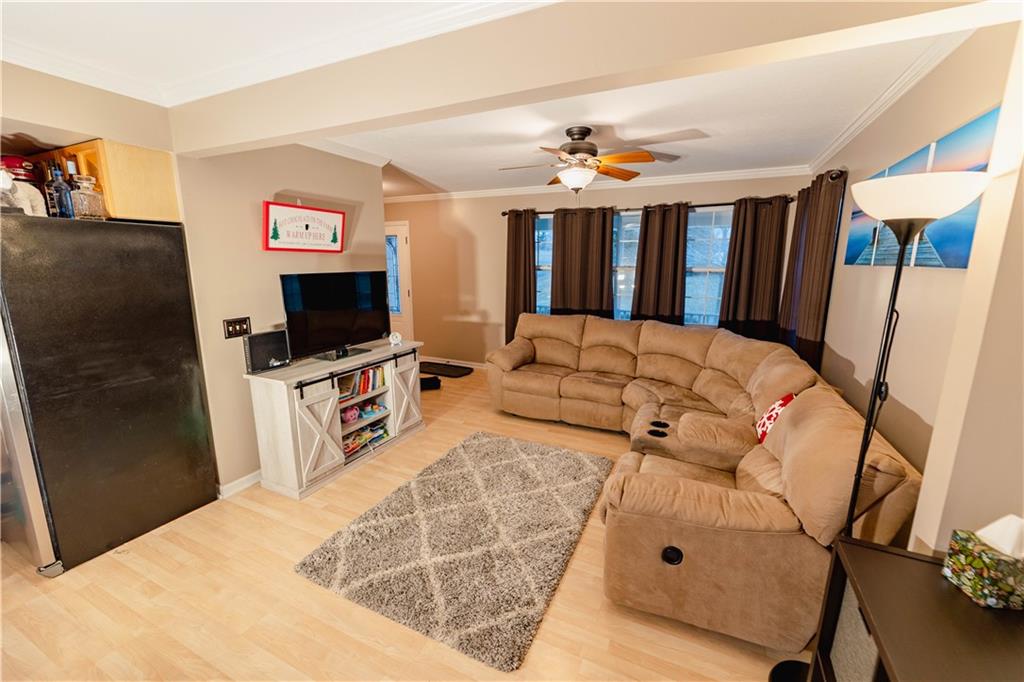 3673 Mitchell Road New Castle, PA 16105 - Photo 4 of 25 a bedroom with a bed and a flat screen tv