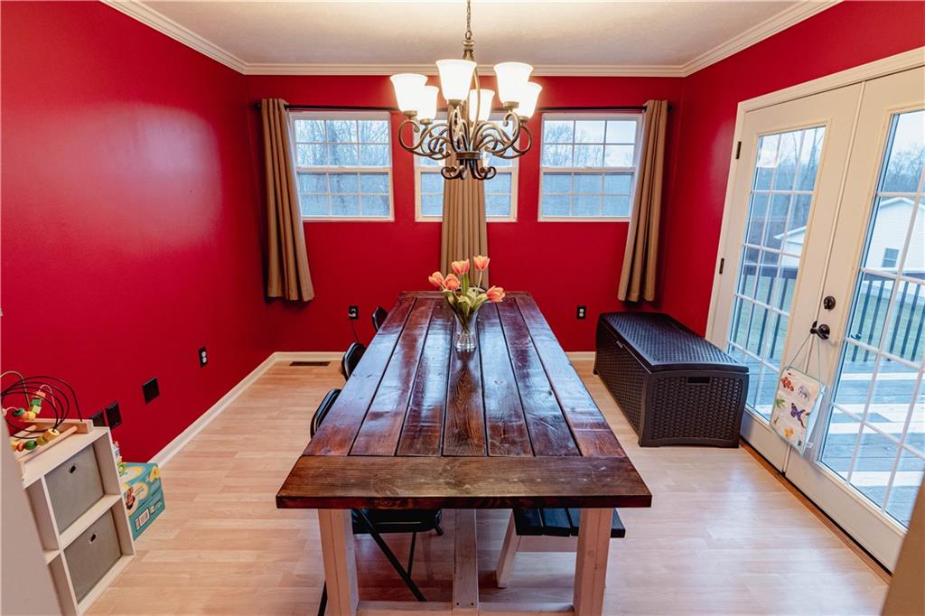 3673 Mitchell Road New Castle, PA 16105 - Photo 10 of 25 a room with furniture and window