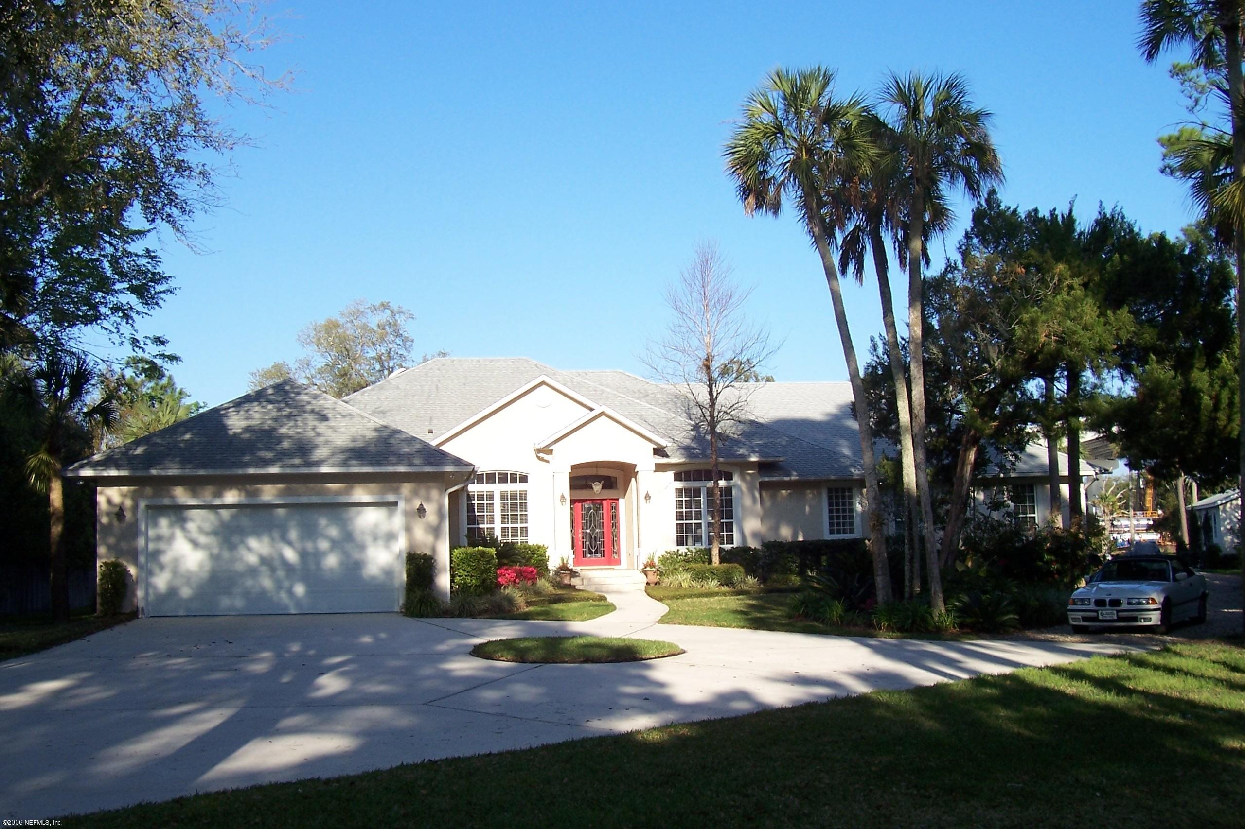 200 Clatter Bridge Road Ponte Vedra Beach, FL 32081 - Photo 1 of 12 a front view of a house with yard and green space