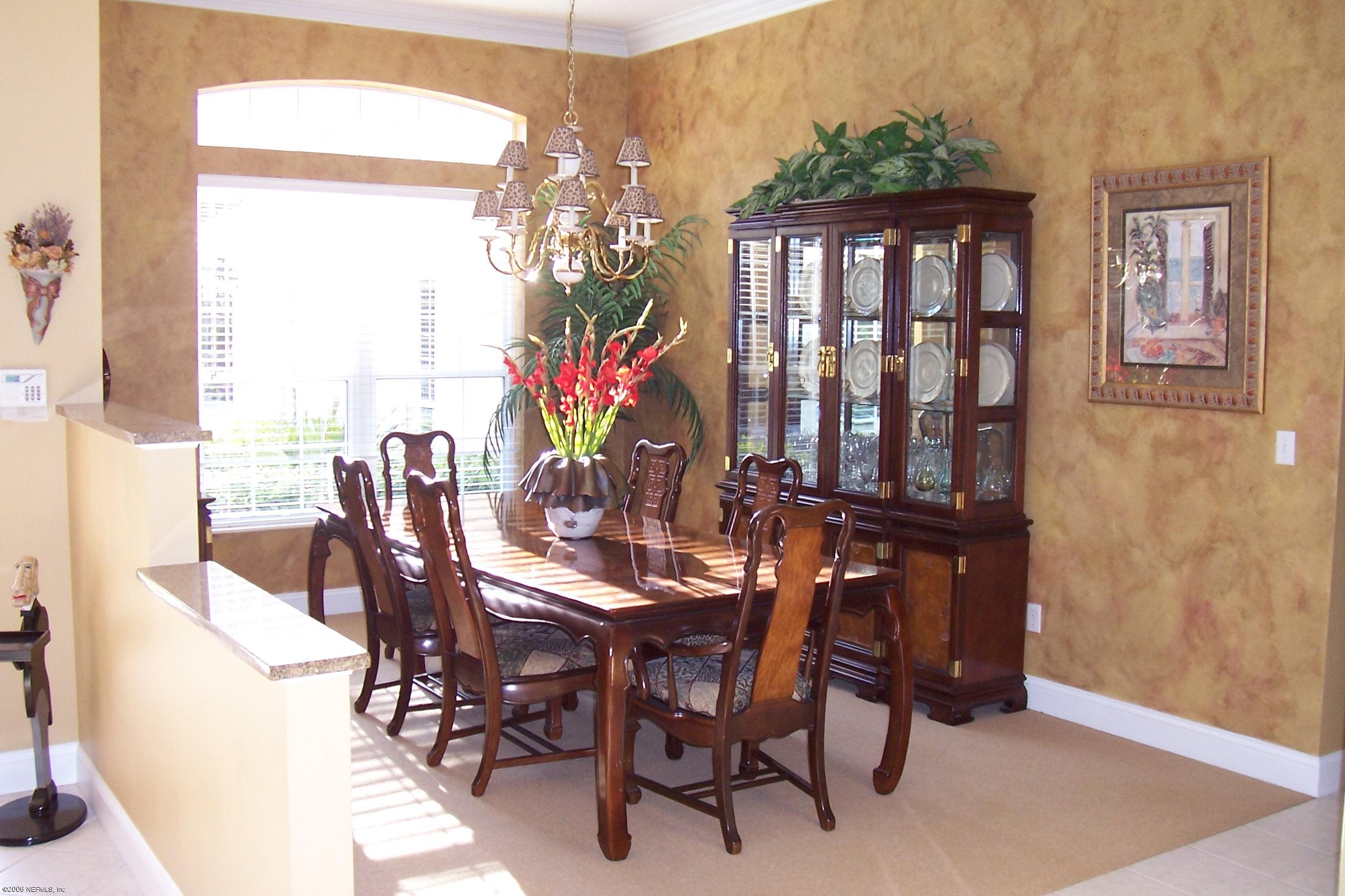 200 Clatter Bridge Road Ponte Vedra Beach, FL 32081 - Photo 2 of 12 a dining room with furniture window and outdoor view
