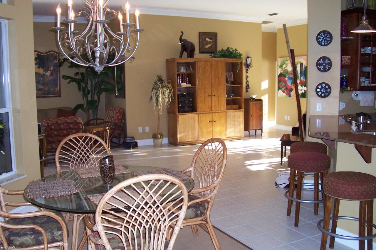 200 Clatter Bridge Road Ponte Vedra Beach, FL 32081 - Photo 4 of 12 a view of a dining room with furniture