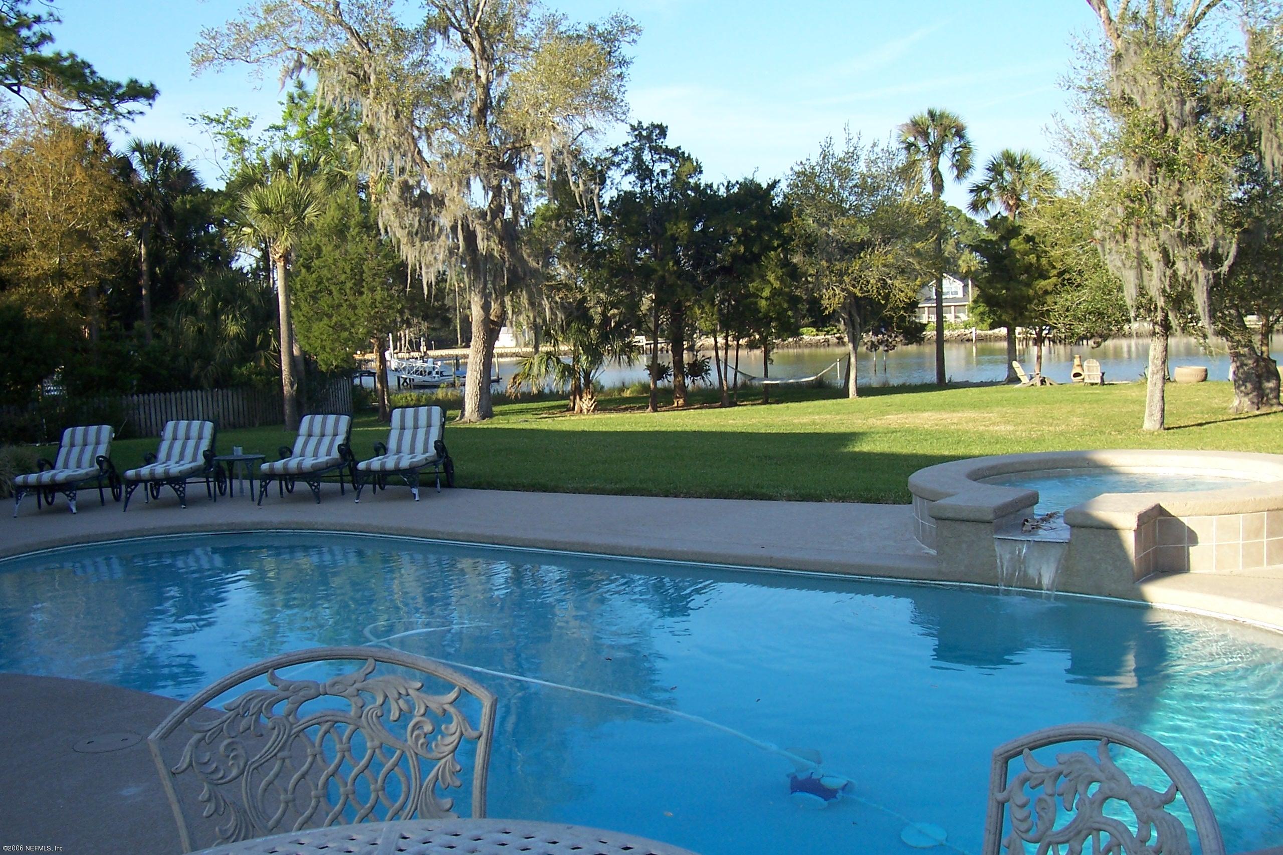 200 Clatter Bridge Road Ponte Vedra Beach, FL 32081 - Photo 10 of 12 a view of a swimming pool and outdoor space