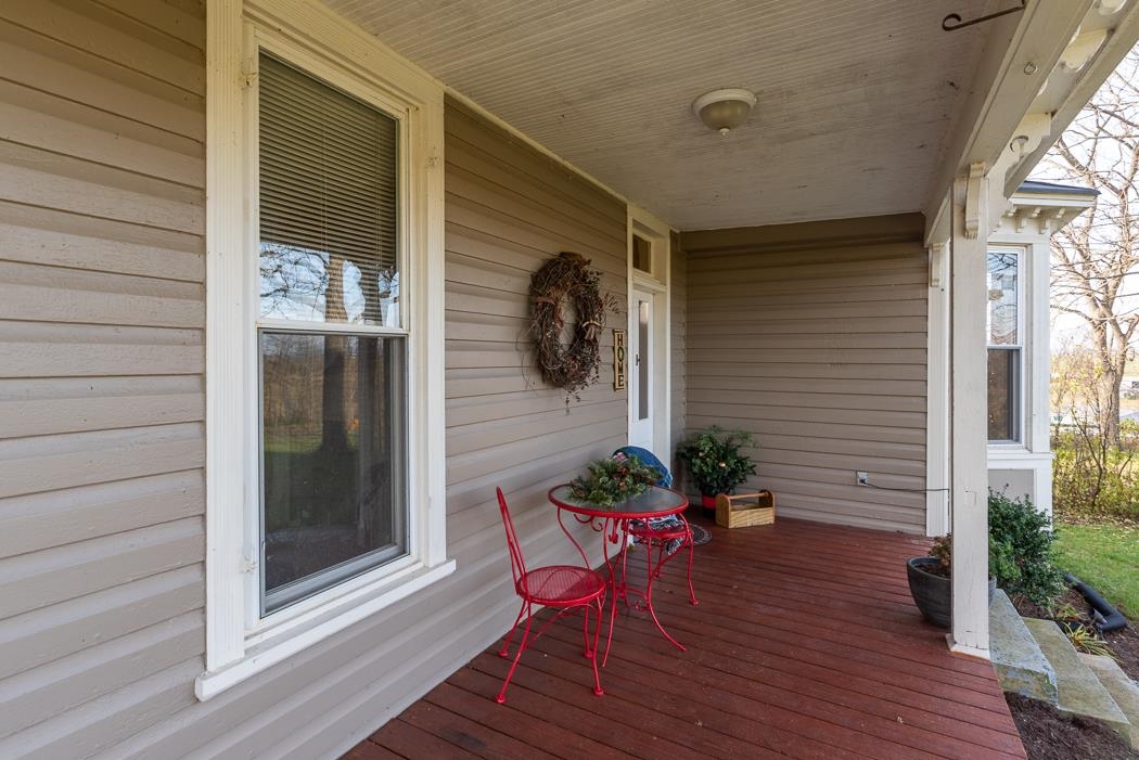 1594 Tinkling Spring Road Staunton, VA 24401 - Photo 18 of 69 a porch with seating space and potted plant