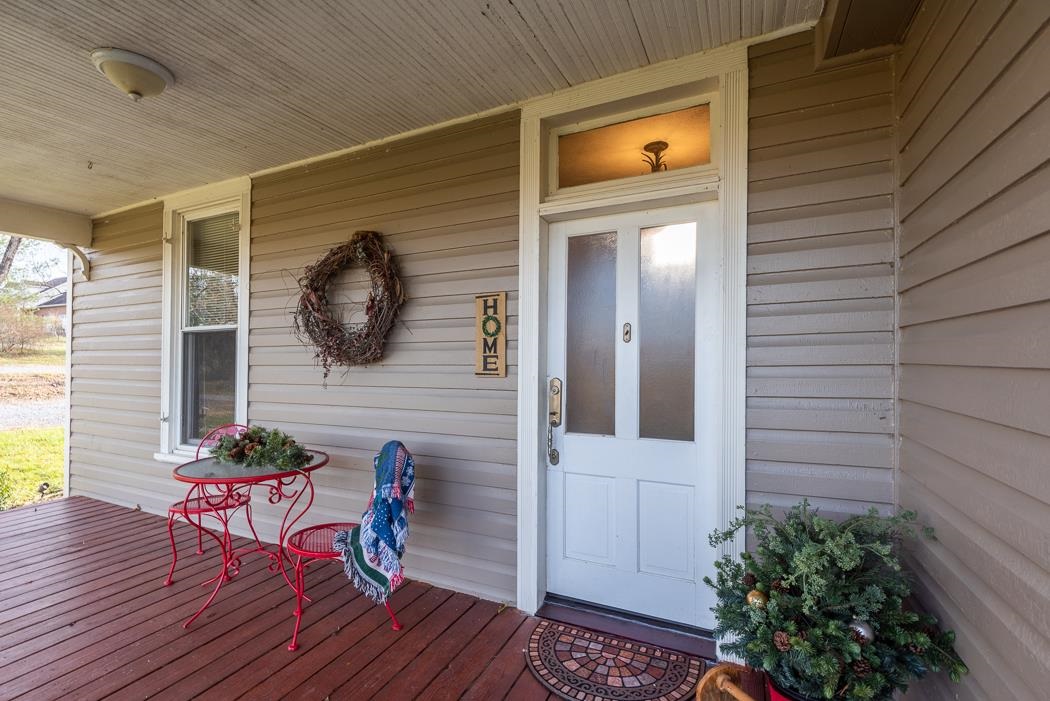 1594 Tinkling Spring Road Staunton, VA 24401 - Photo 20 of 69 a view of a door and chair in the balcony