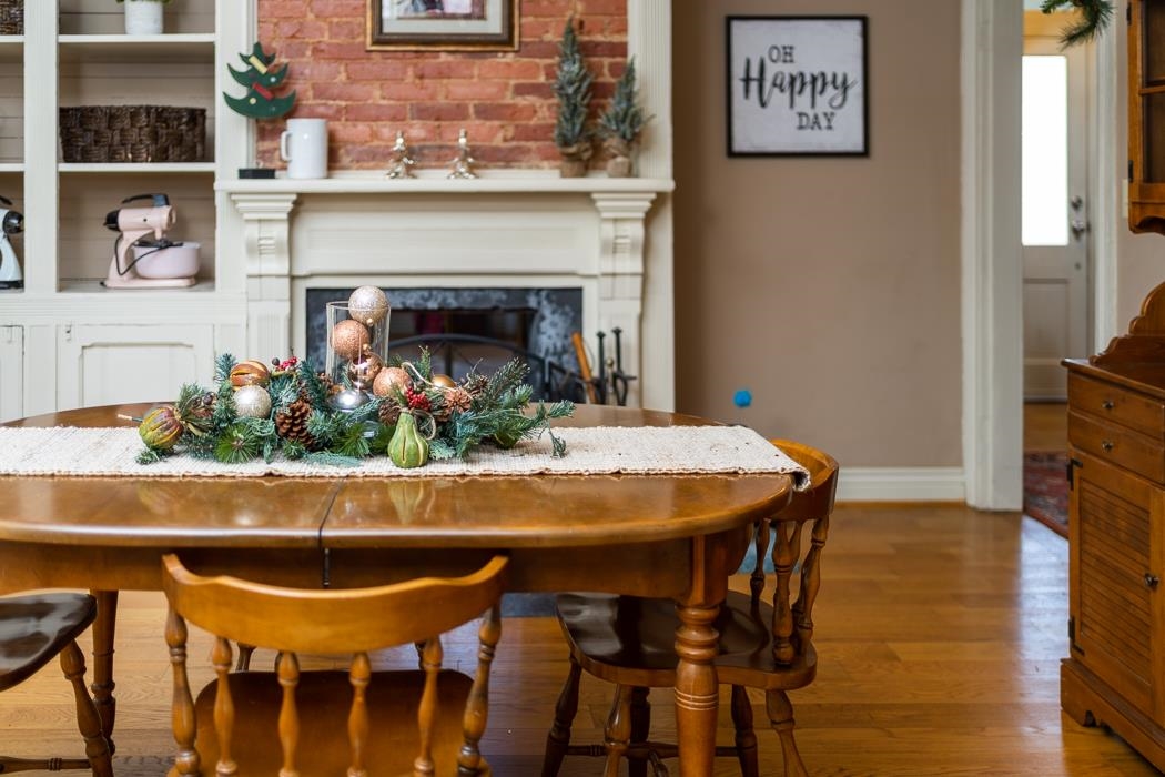 1594 Tinkling Spring Road Staunton, VA 24401 - Photo 27 of 69 a view of a dining room with furniture and wooden floor