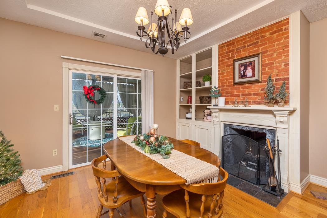 1594 Tinkling Spring Road Staunton, VA 24401 - Photo 31 of 69 a view of a dining room with furniture wooden floor and chandelier