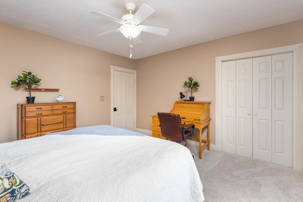 1594 Tinkling Spring Road Staunton, VA 24401 - Photo 50 of 69 a bedroom with a bed and dresser
