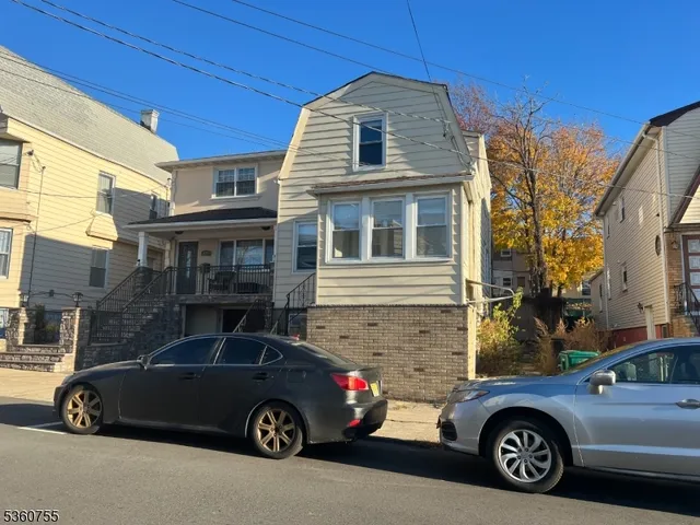 a car parked in front of a house