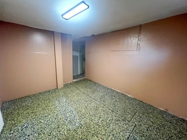 an empty room with a workbench