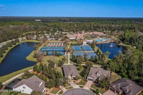 an aerial view of a house with a garden