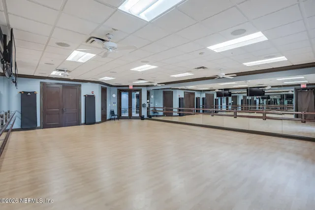 a view of a swimming pool and lounge chair