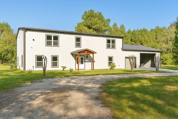a view of a yard in front of a house