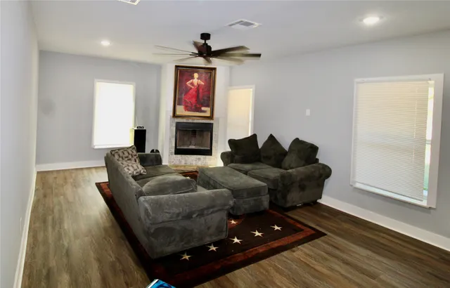 a bathroom with a shower and a window