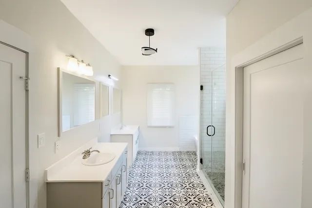 a bathroom with a sink and toilet