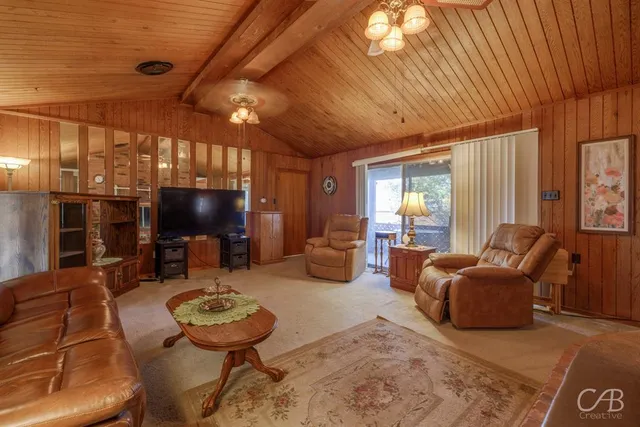 a room with furniture and a flat screen tv