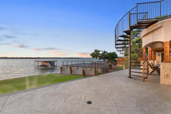 a view of a swimming pool with a lounge chair