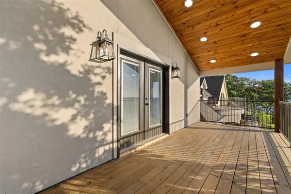 a spacious bathroom with a glass door shower and yard