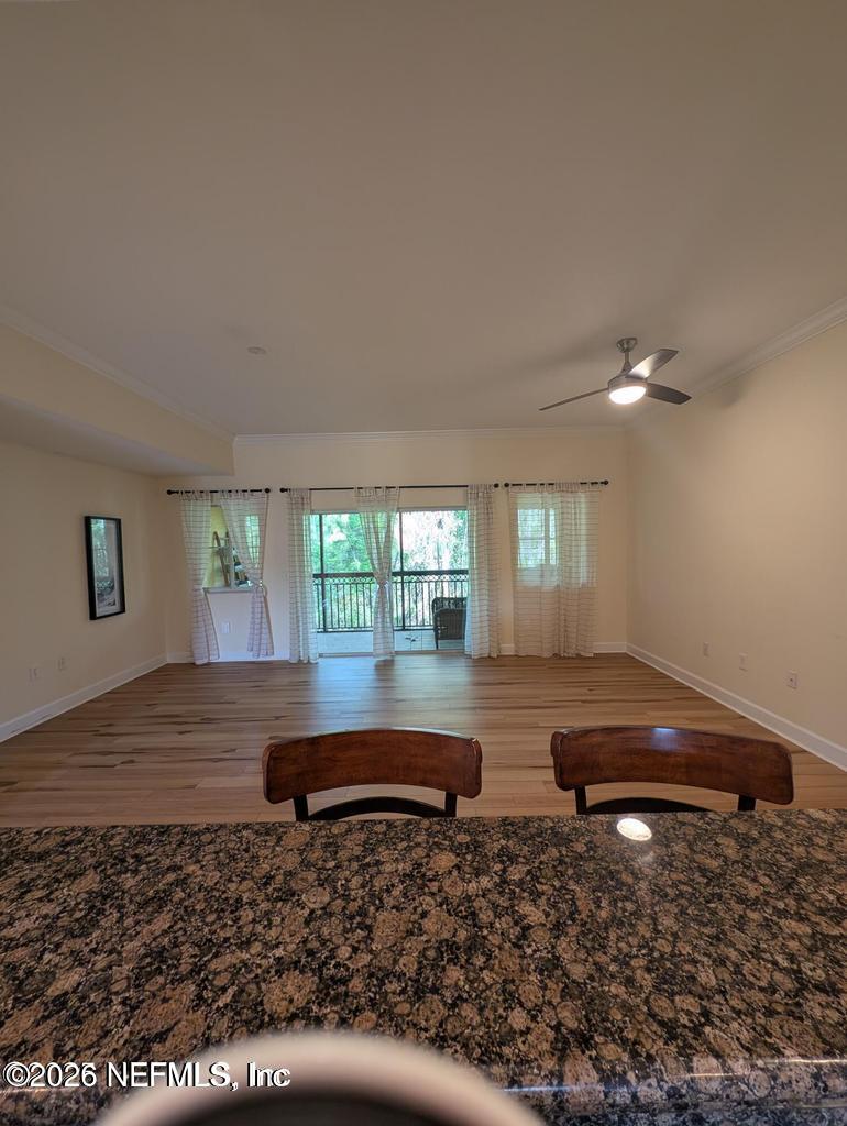 9745 Touchton Road, Unit 2327 Jacksonville, FL 32246 - Photo 5 of 19 KITHCEN VIEW TO FAMILY ROOM