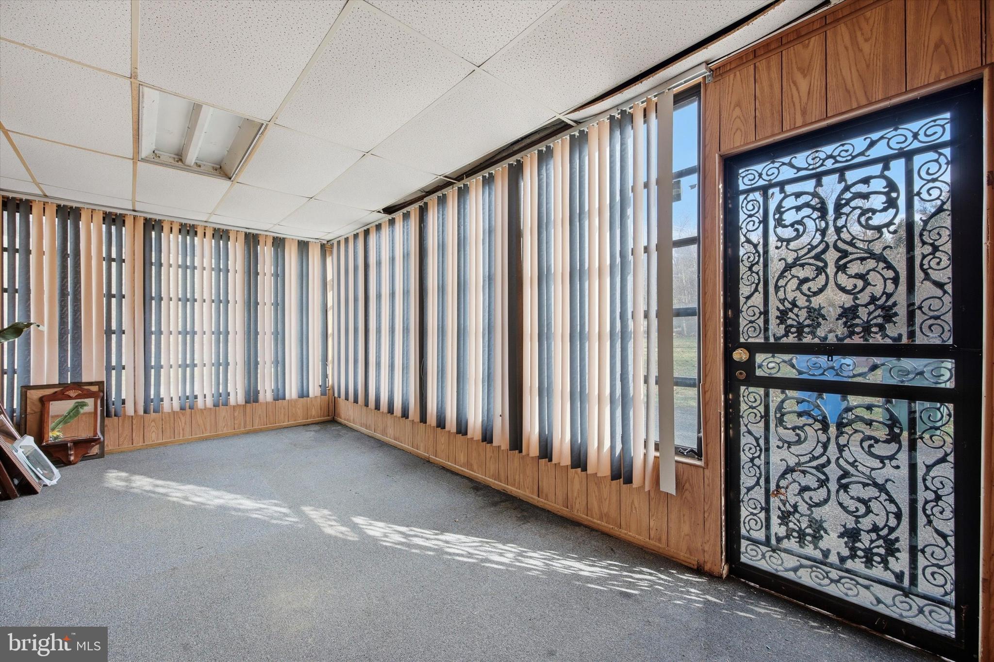 129 Locksley Road Glen Mills, PA 19342 - Photo 11 of 36 a view of an empty room with a window