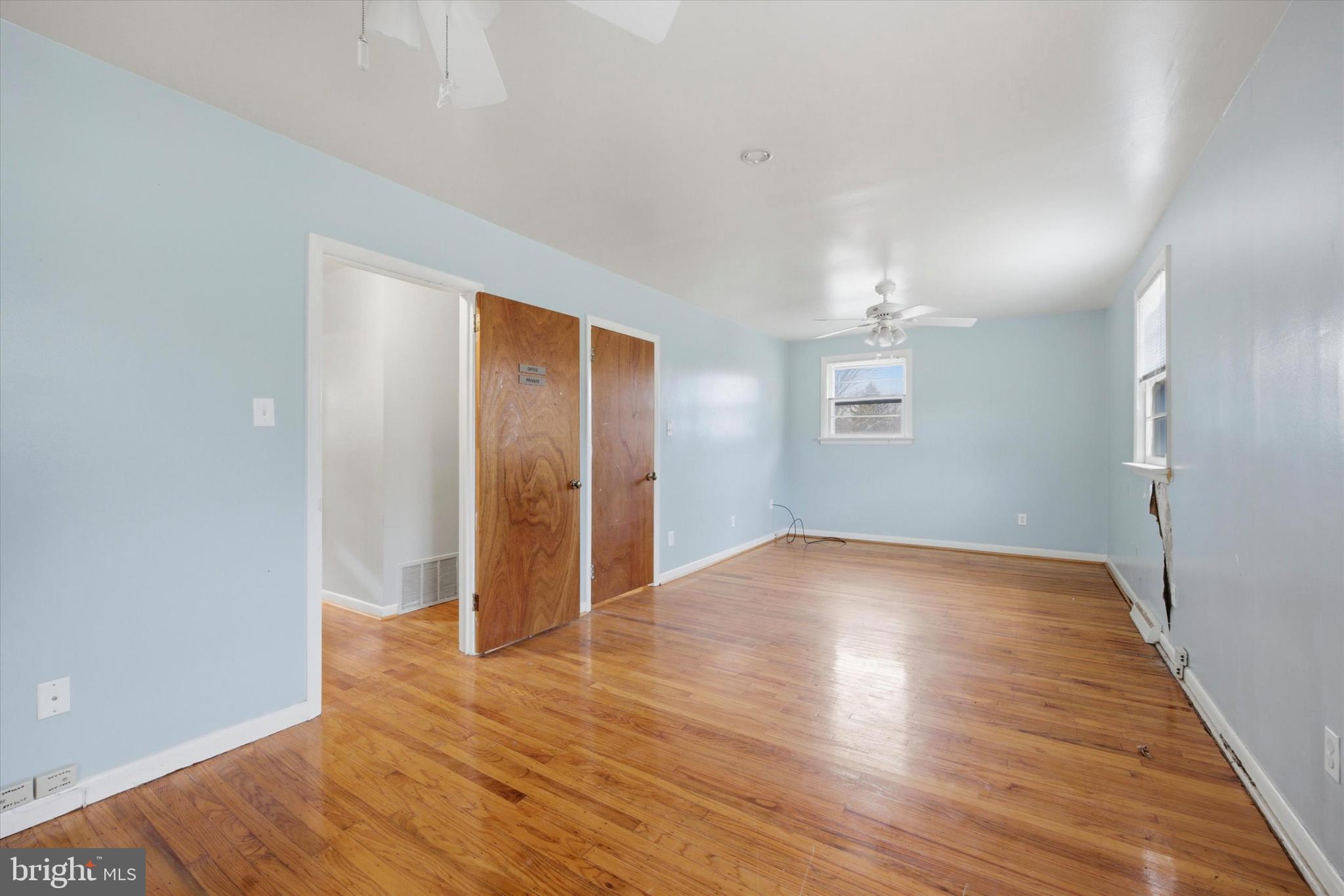 129 Locksley Road Glen Mills, PA 19342 - Photo 14 of 36 a view of empty room with wooden floor