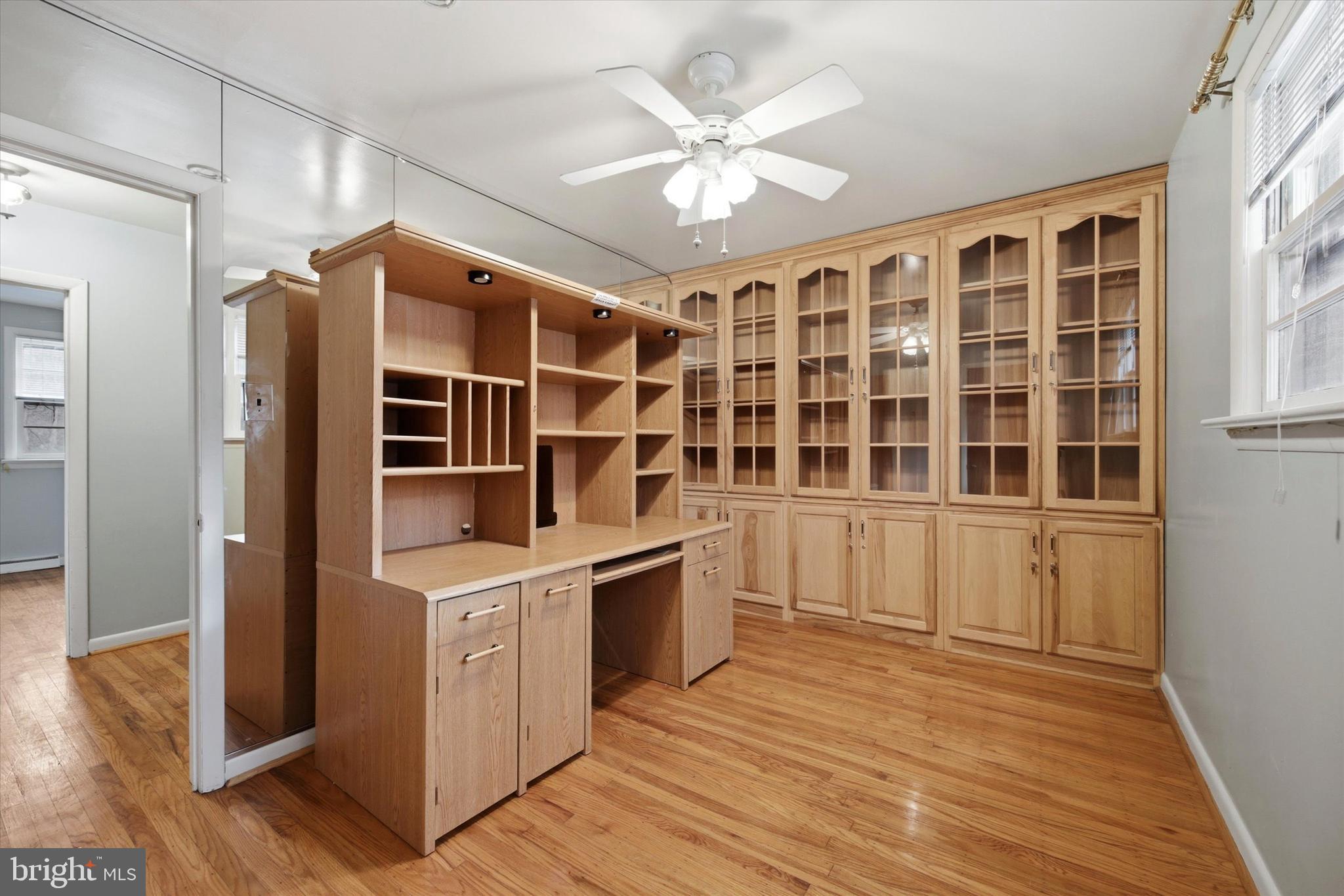129 Locksley Road Glen Mills, PA 19342 - Photo 20 of 36 a view of a kitchen with stainless steel appliances wooden floor and a window