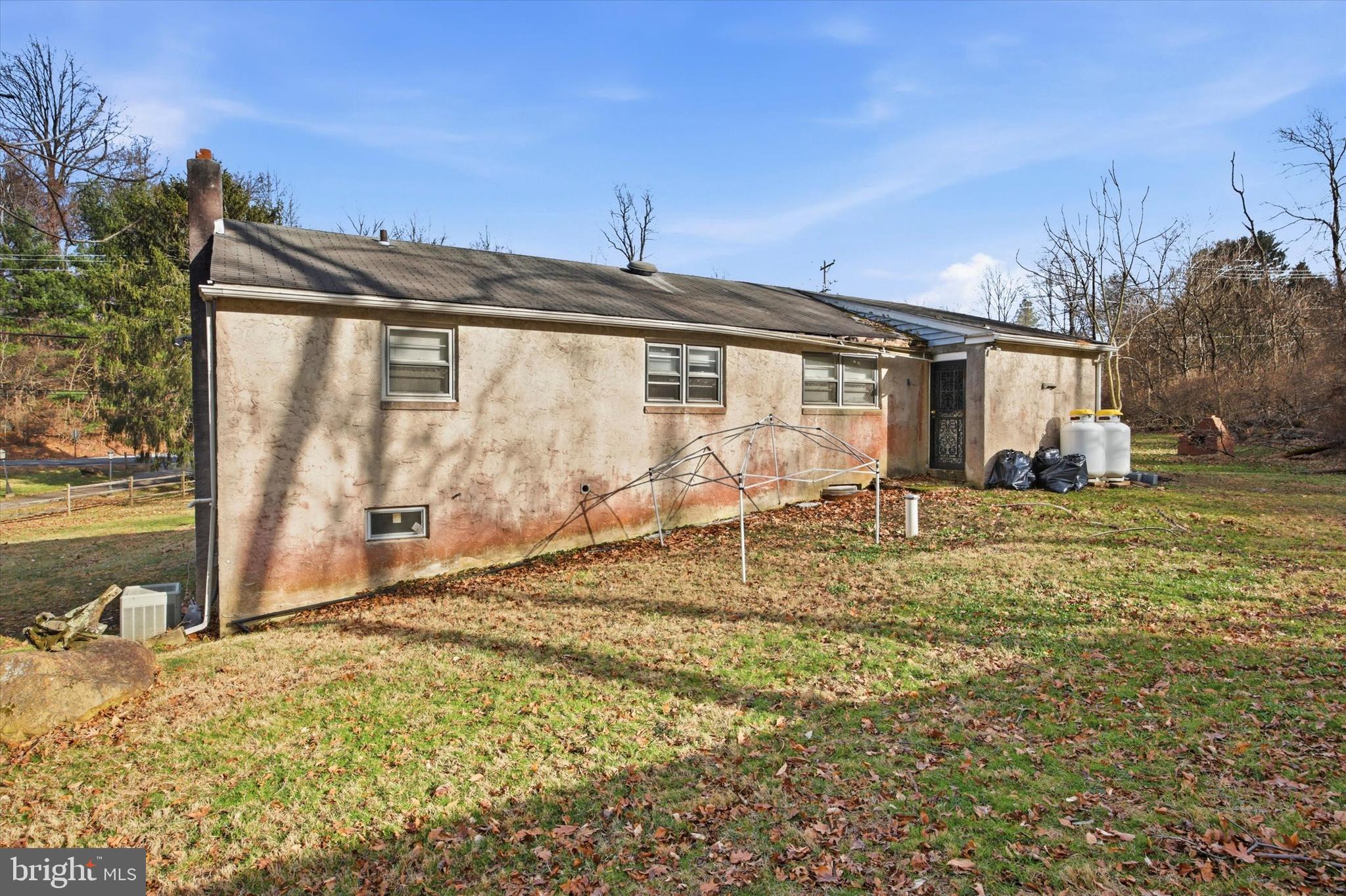 129 Locksley Road Glen Mills, PA 19342 - Photo 26 of 36 a view of a house with backyard
