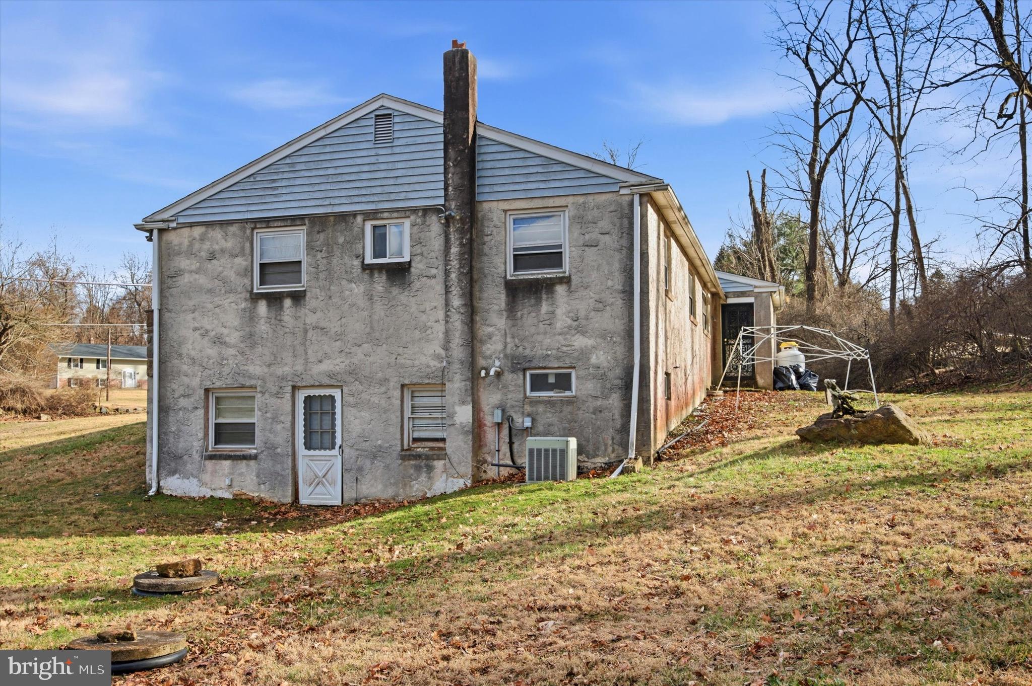 129 Locksley Road Glen Mills, PA 19342 - Photo 27 of 36 a front view of a house with a yard