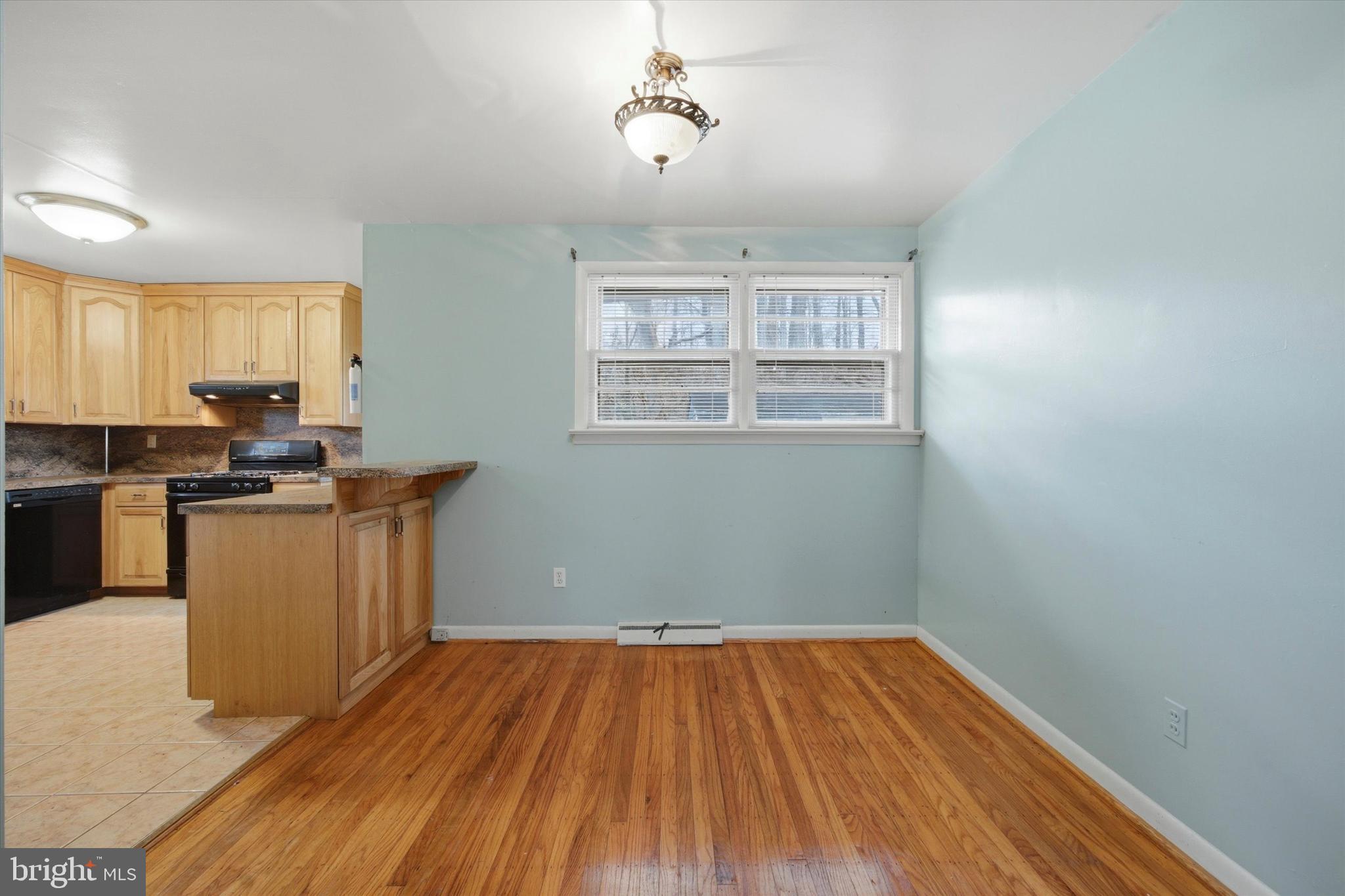 129 Locksley Road Glen Mills, PA 19342 - Photo 8 of 36 a view of kitchen with wooden floor