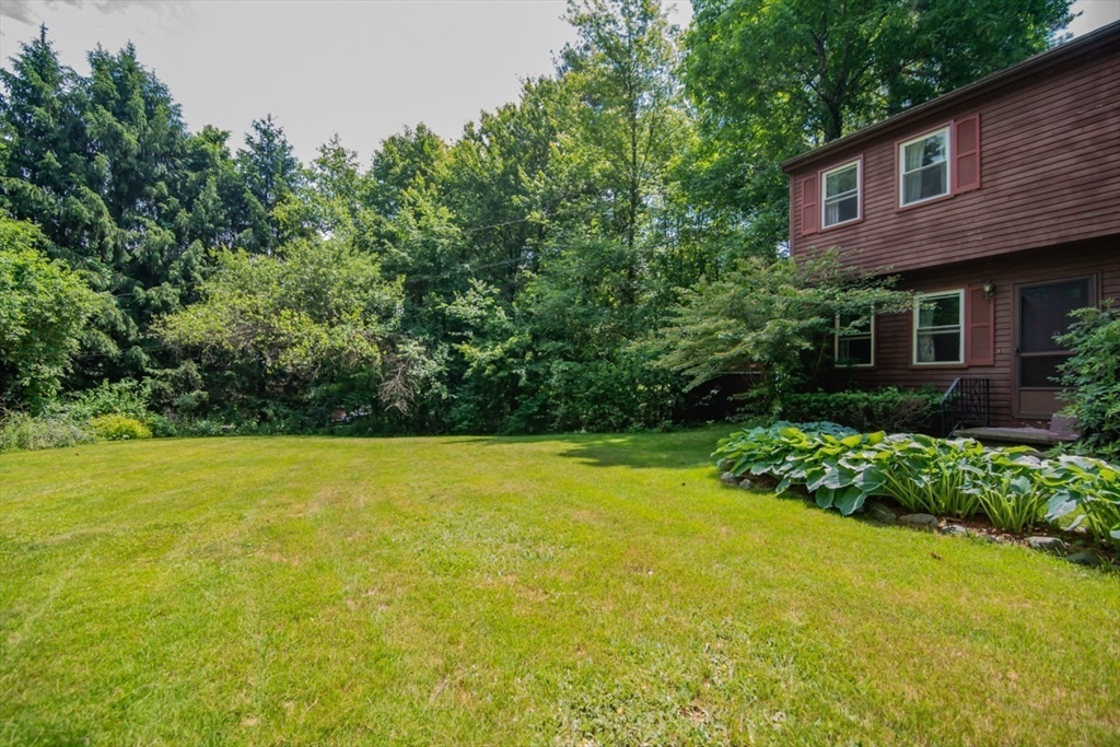 126 Squannacook Road Shirley, MA 01464 - Photo 3 of 12 a view of a house with pool and garden