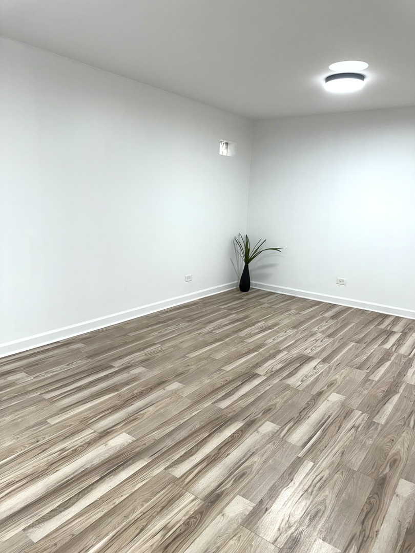 2308 Oakton Street, Unit 1 Park Ridge, IL 60068 - Photo 8 of 11 a view of empty room
