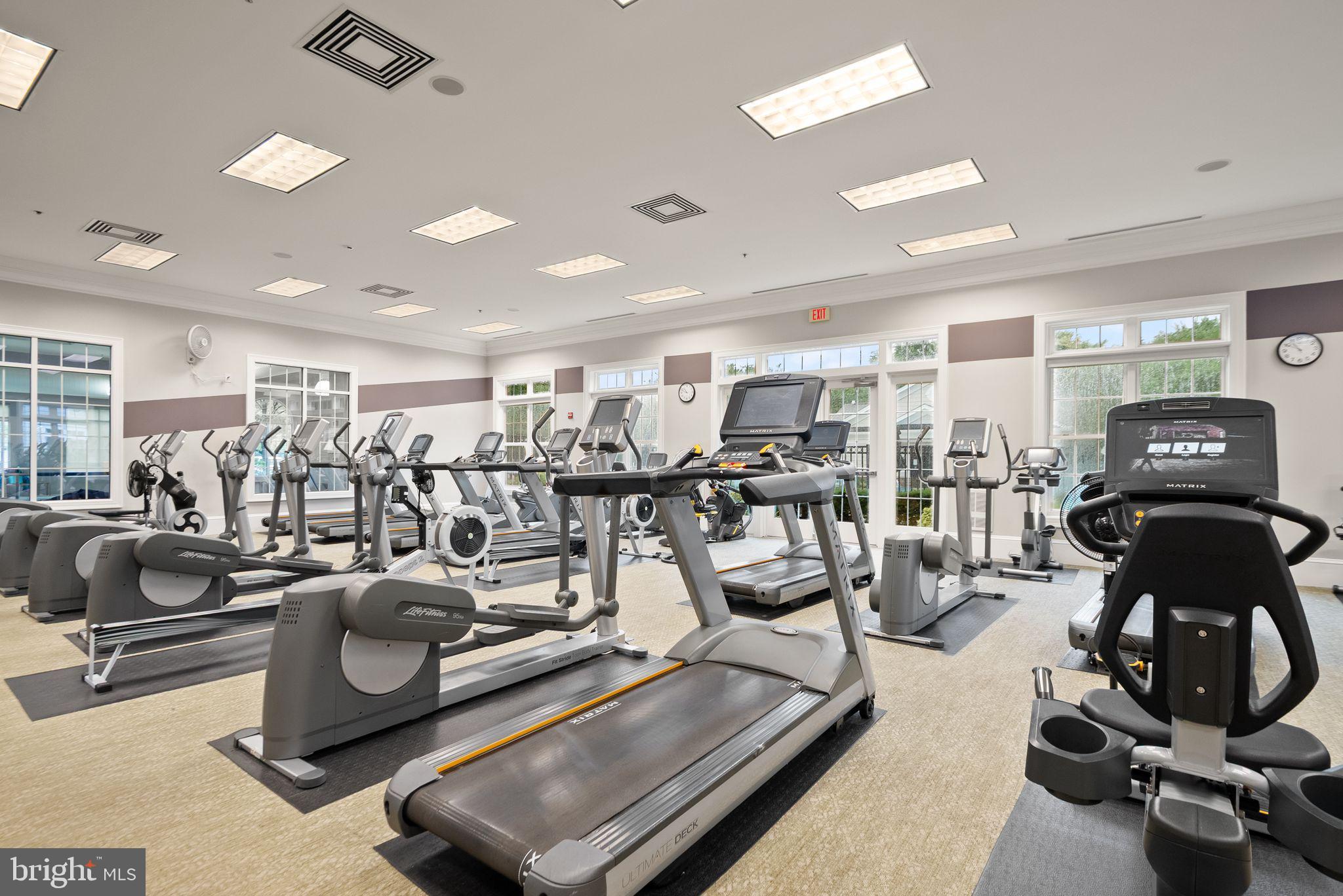 20610 Hope Spring Terrace, Unit 104 Ashburn, VA 20147 - Photo 30 of 38 Modern fitness center with ample equipment.