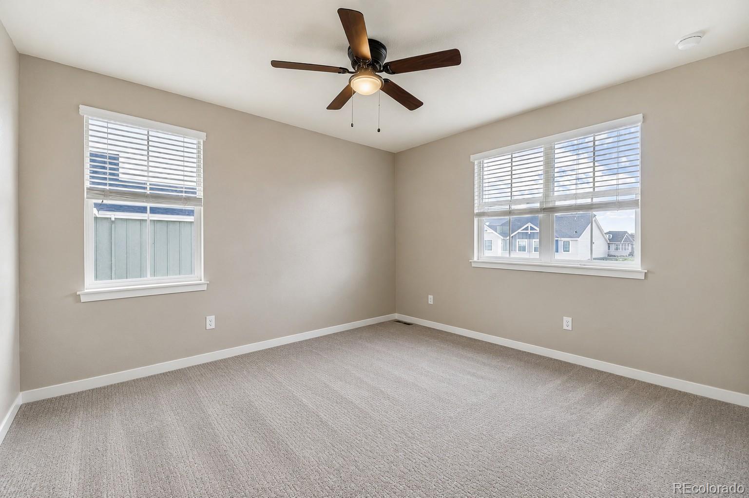 1173 Williams Loop Elizabeth, CO 80107 - Photo 18 of 30 a view of an empty room with a window