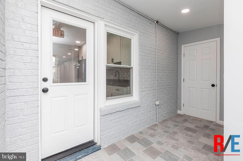 4100 Queensbury Road Hyattsville, MD 20781 - Photo 21 of 24 Charming entryway with modern flair.