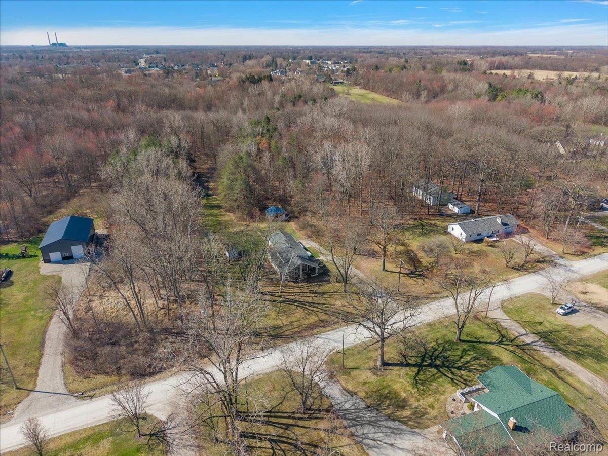 4705 Ketchum Road St. Clair, MI 48079 - Photo 58 of 58 Drone / aerial view of a heavily wooded area