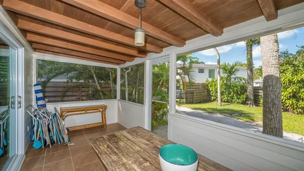 a bathroom with a tub and sink
