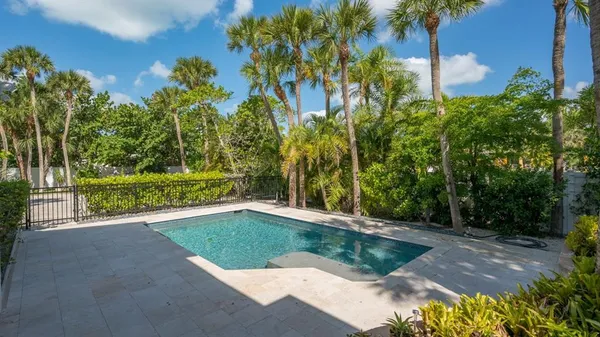 a view of backyard with green space