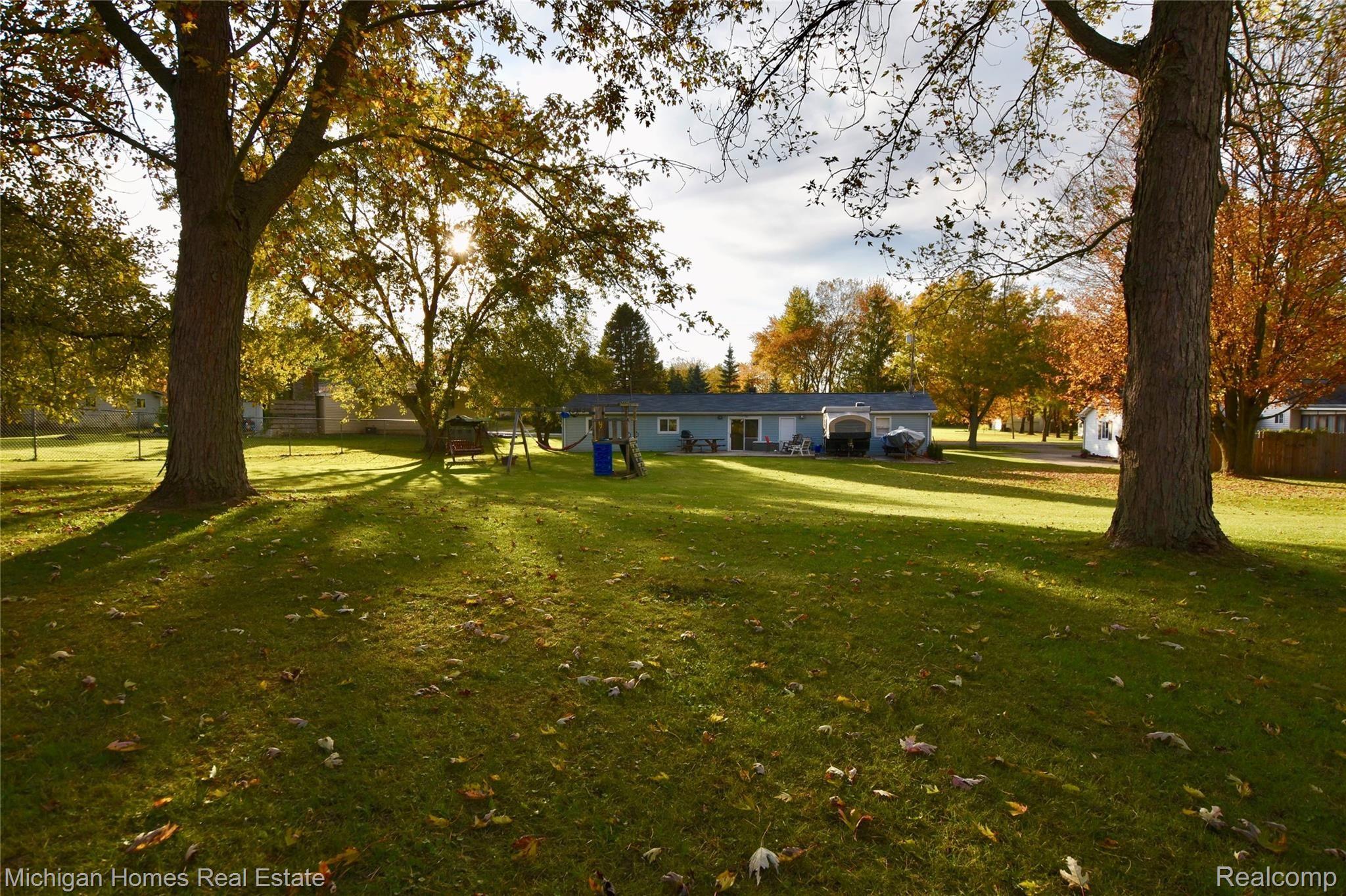 Awesome back yard with lots of room to play and have a garden even a place to park the boat and camper!