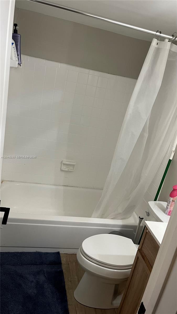 1530 Southwest 2nd Street, Unit 307 Miami, FL 33135 - Photo 7 of 7 a bathroom with a toilet and a shower
