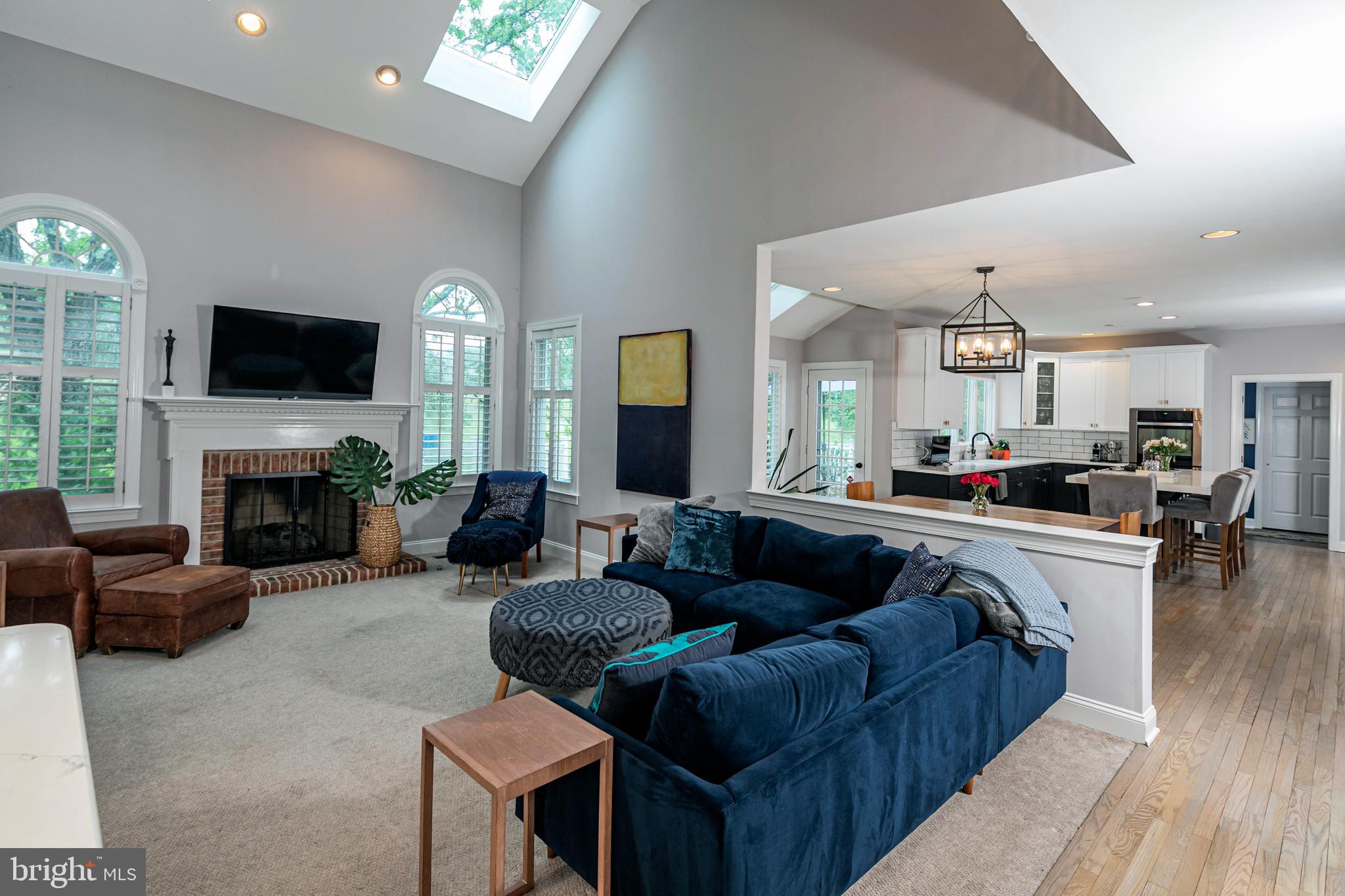 173 Christopher Drive Princeton, NJ 08540 - Photo 18 of 61 a living room with furniture fireplace and flat screen tv