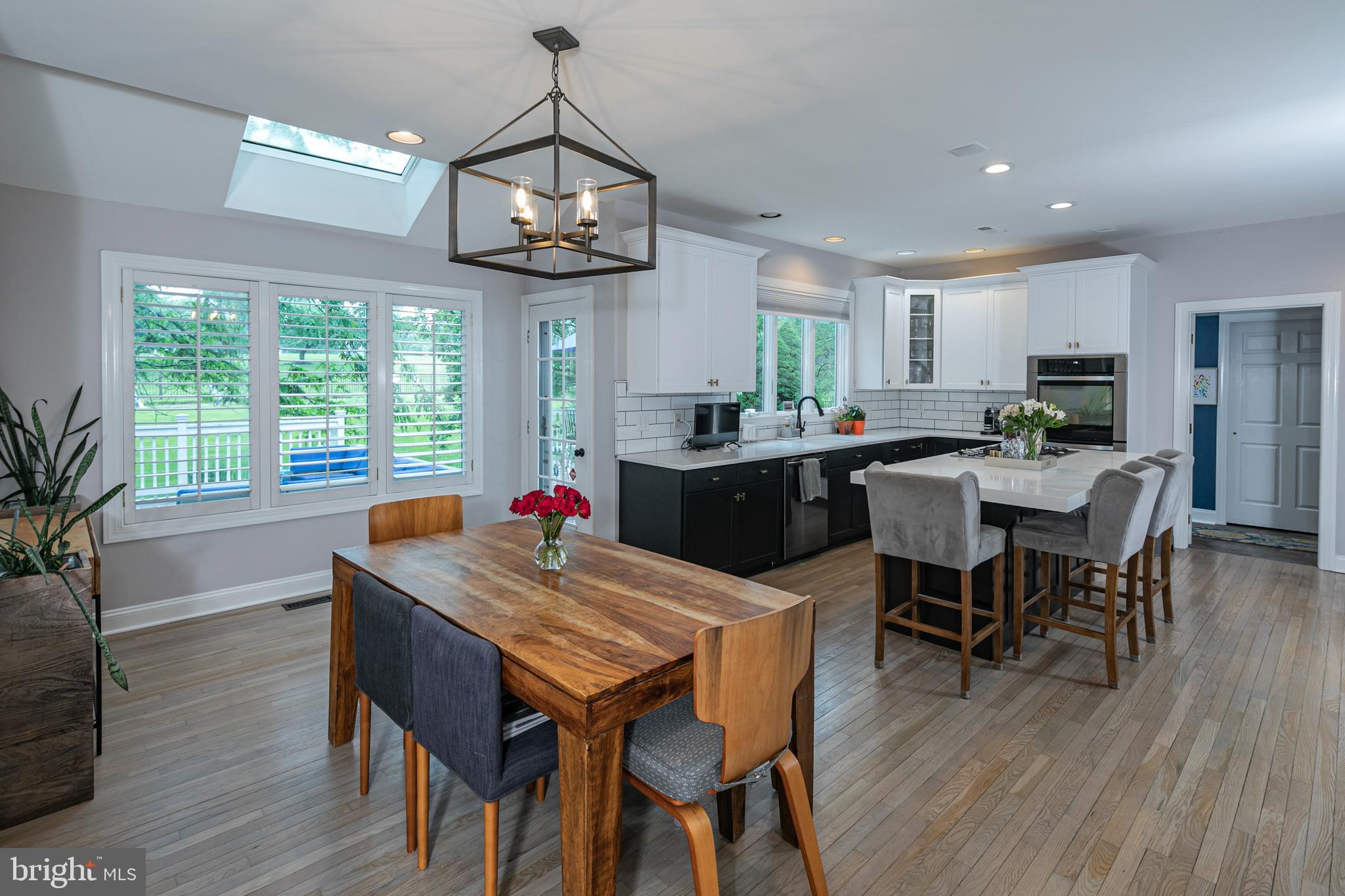 173 Christopher Drive Princeton, NJ 08540 - Photo 19 of 61 a view of a dining room with furniture window and wooden floor