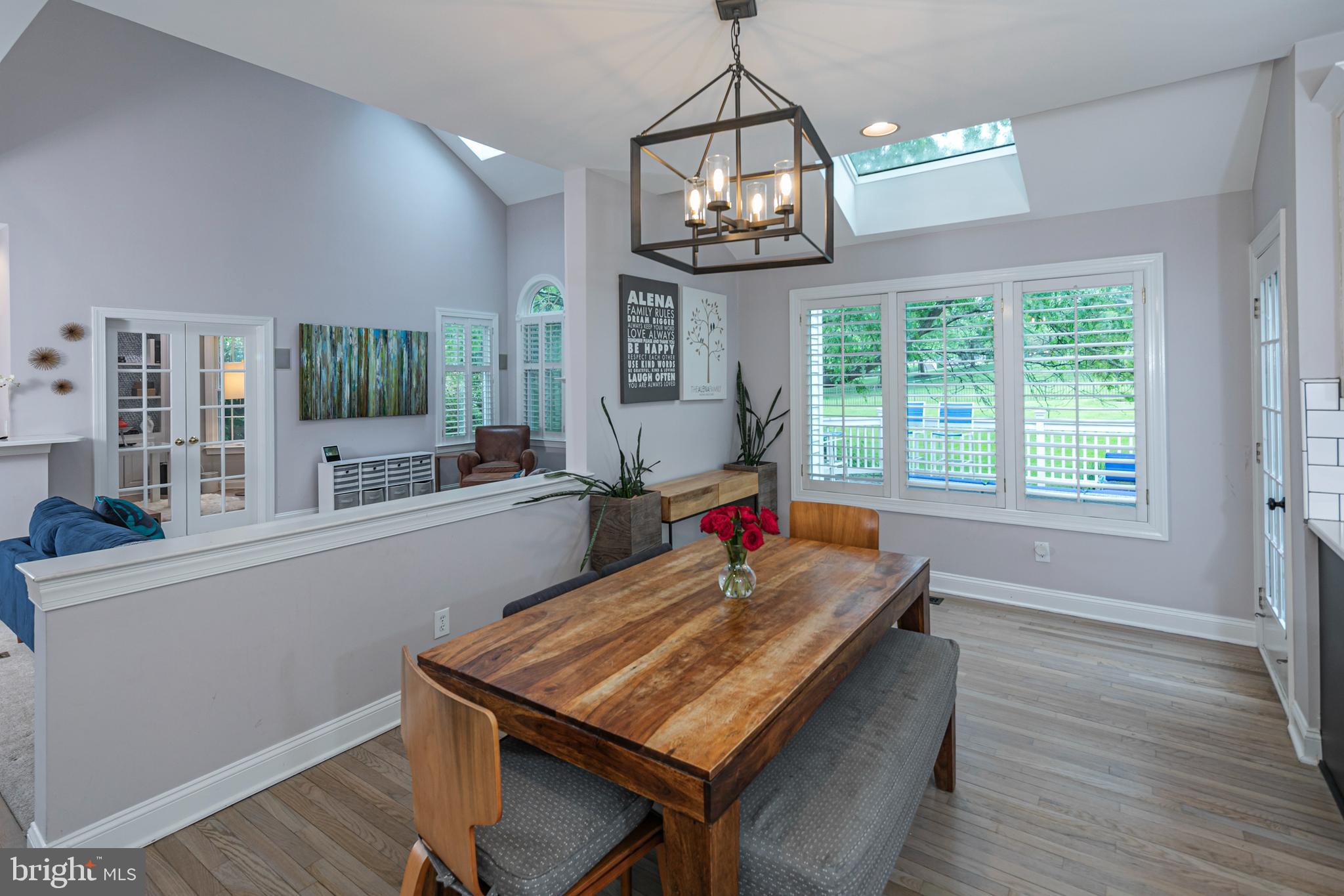 173 Christopher Drive Princeton, NJ 08540 - Photo 20 of 61 a view of a dining room with furniture wooden floor and chandelier