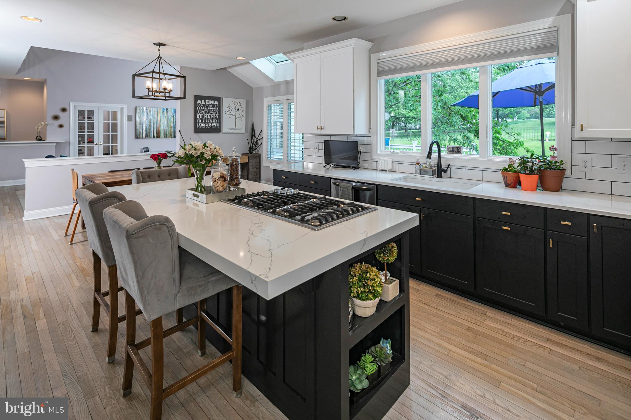 173 Christopher Drive Princeton, NJ 08540 - Photo 21 of 61 a view of kitchen with stainless steel appliances granite countertop sink stove a dining table and chairs in it