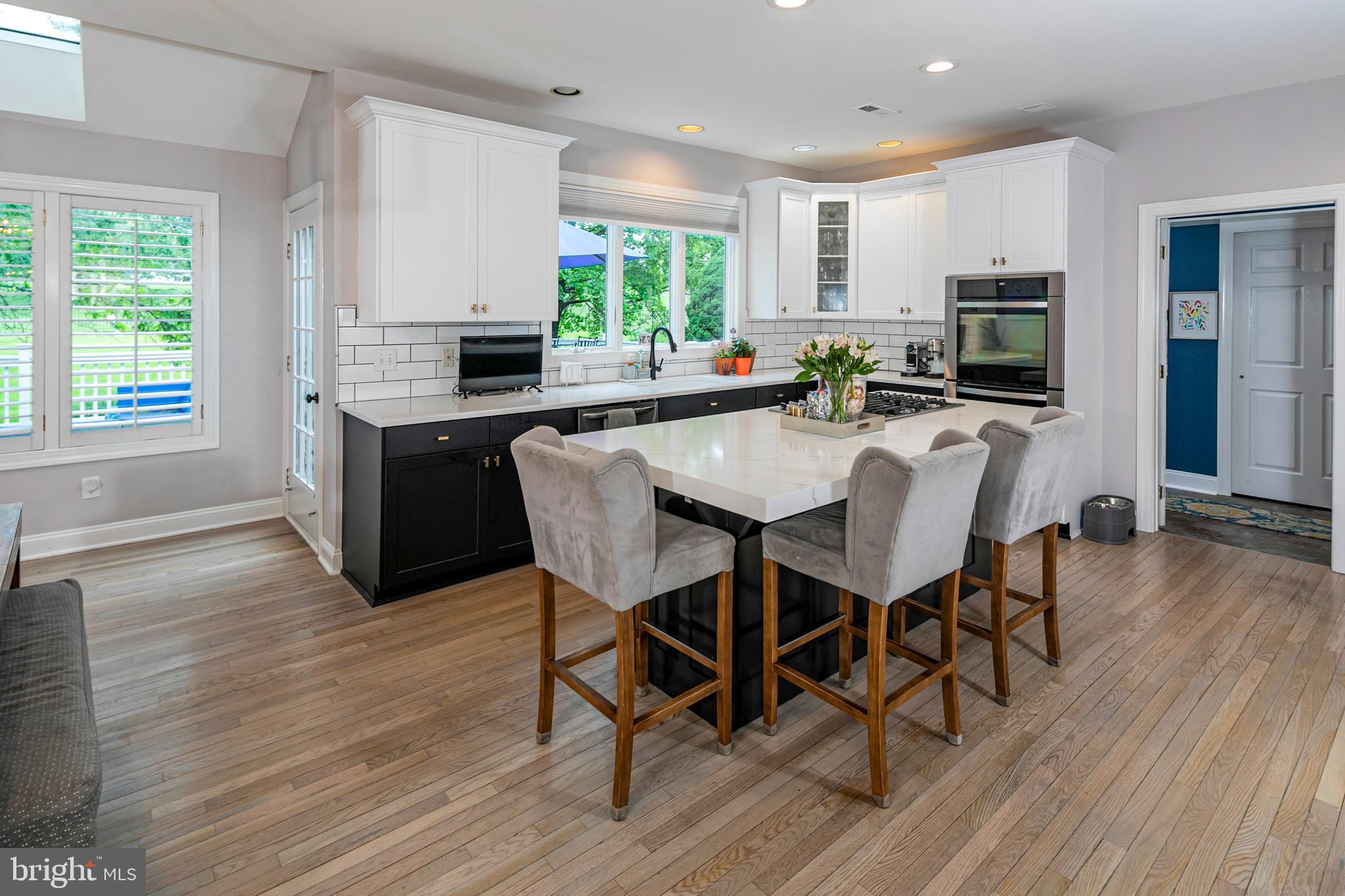 173 Christopher Drive Princeton, NJ 08540 - Photo 23 of 61 a view of a dining room with furniture and wooden floor