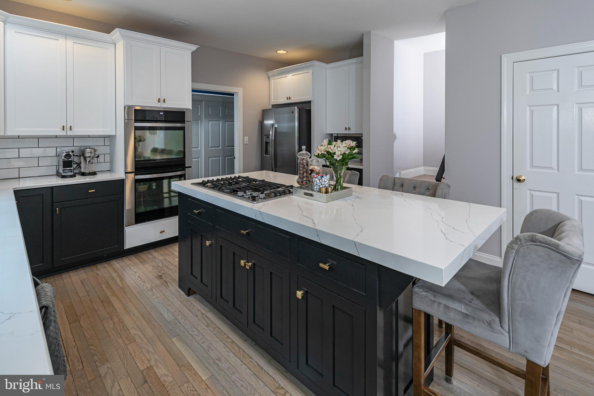 173 Christopher Drive Princeton, NJ 08540 - Photo 25 of 61 a kitchen with a stove a sink and a refrigerator