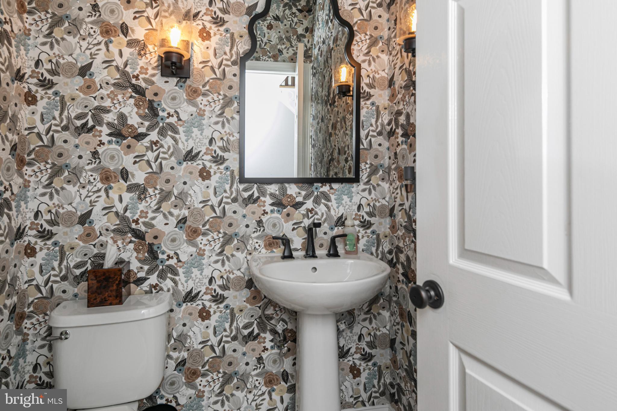 173 Christopher Drive Princeton, NJ 08540 - Photo 27 of 61 a bathroom with a toilet sink and mirror