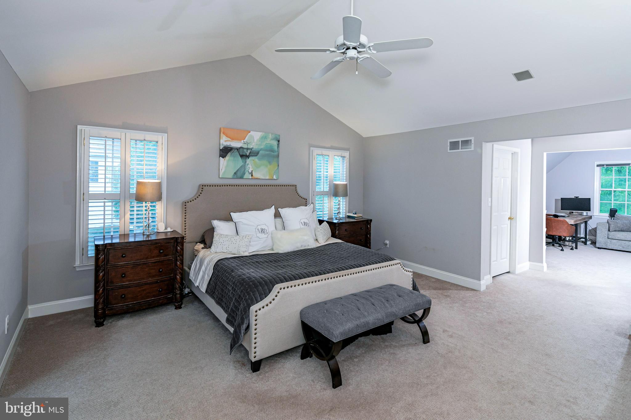 173 Christopher Drive Princeton, NJ 08540 - Photo 29 of 61 a spacious bedroom with a bed and a chandelier