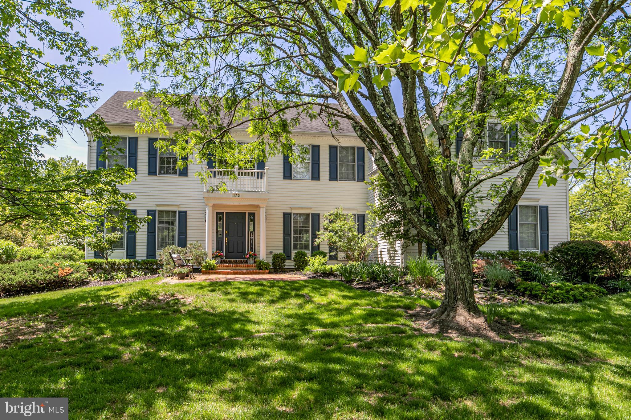 173 Christopher Drive Princeton, NJ 08540 - Photo 3 of 61 a front view of a house with garden