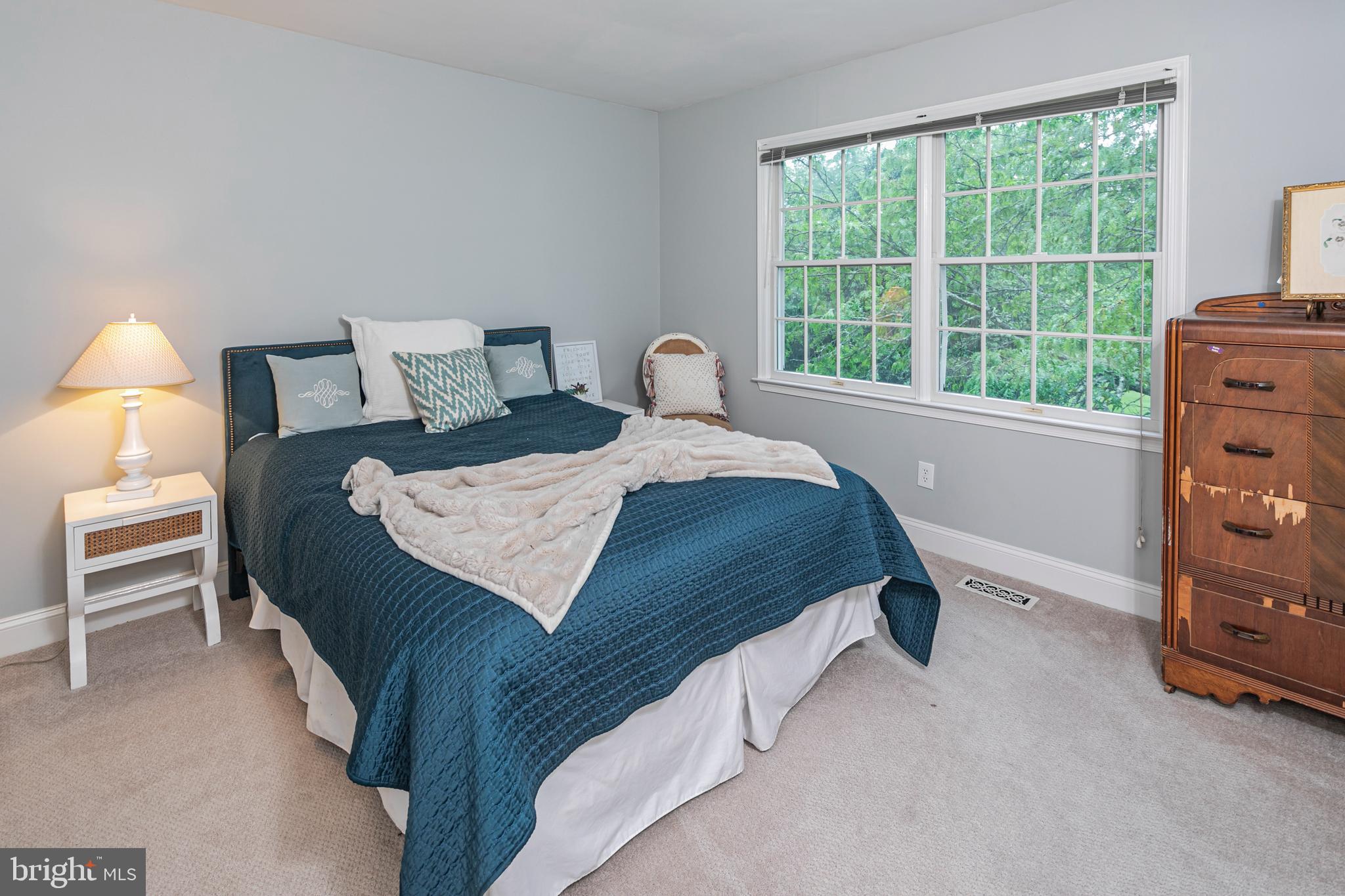 173 Christopher Drive Princeton, NJ 08540 - Photo 36 of 61 a bedroom with a bed and a window